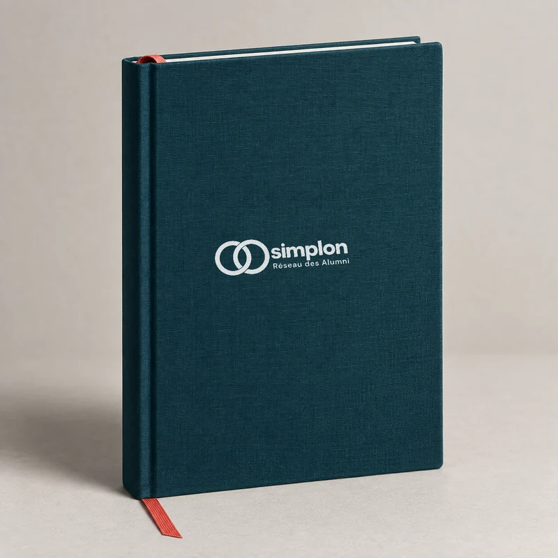 Carnet Simplon Réseau des Alumni, couverture bleu-vert foncé.